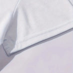 Détail du tissu et couture du tee-shirt femme blanc imprimé Paris La Ville Lumière, matière douce