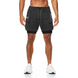 Short sport homme ECET noir – porté de face, maintien optimal, design moderne et poches fonctionnelles.