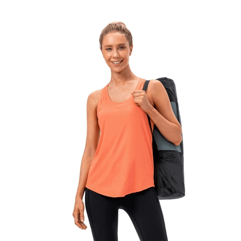 Look fitness femme avec débardeur sport orange - style et confort