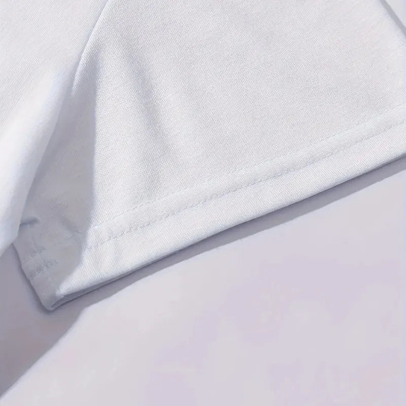 Détail du tissu et couture du tee-shirt femme blanc imprimé Paris La Ville Lumière, matière douce