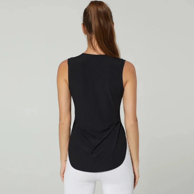 Débardeur de sport femme noir respirant vu de dos, idéal pour le fitness, le yoga et l’entraînement intensif