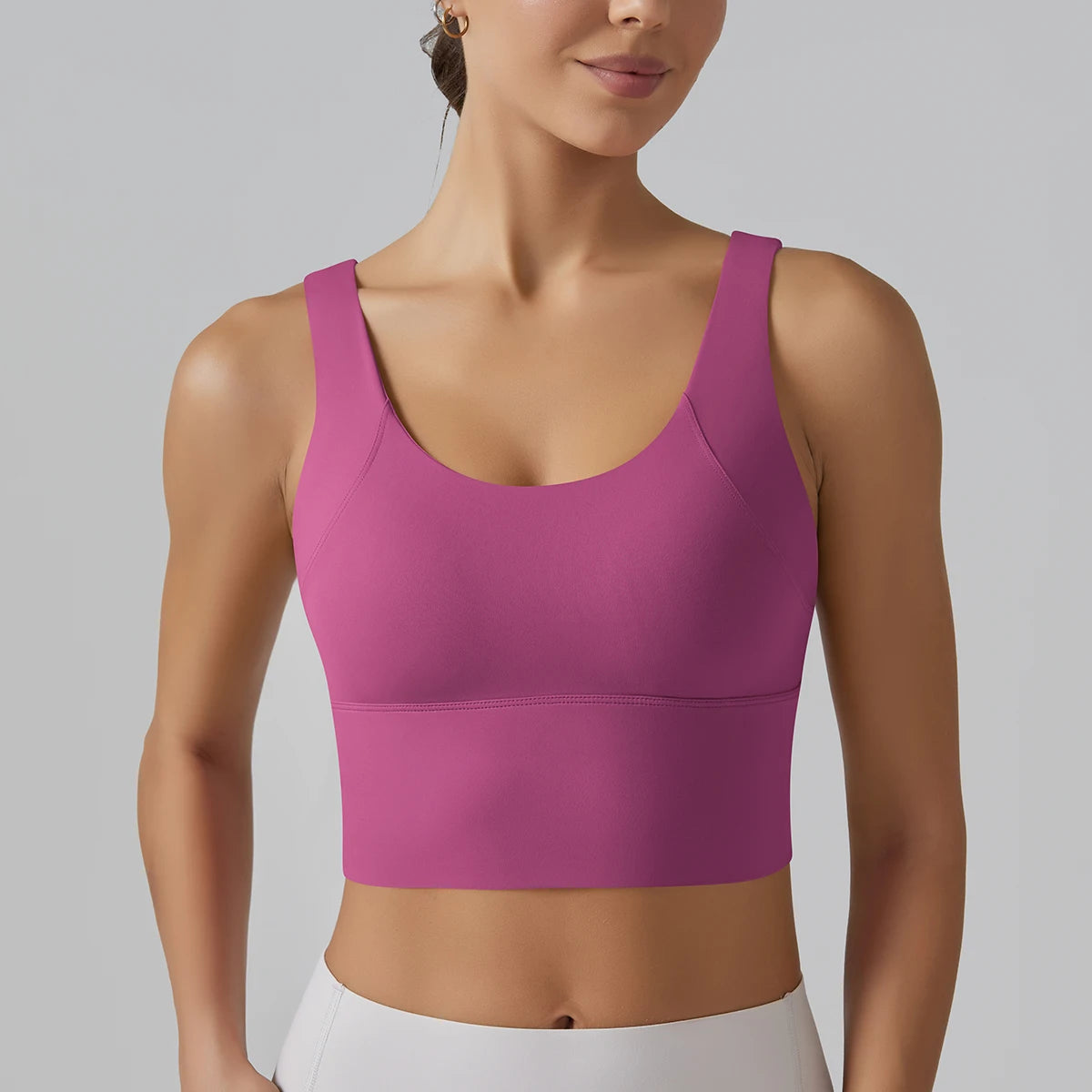 Débardeur de sport femme couleur Orchid Pulse, maintien gainant et tissu respirant, vue de face.