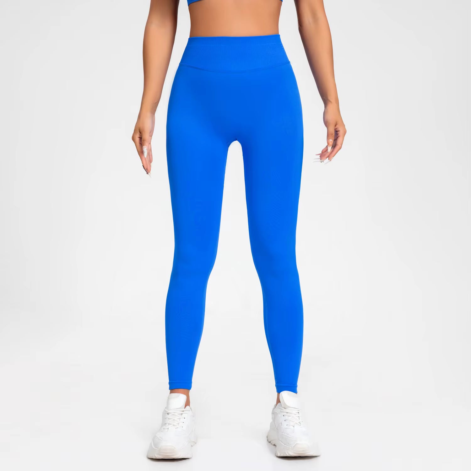 Legging de sport femme bleu électrique taille haute avec coupe ajustée et maintien confortable
