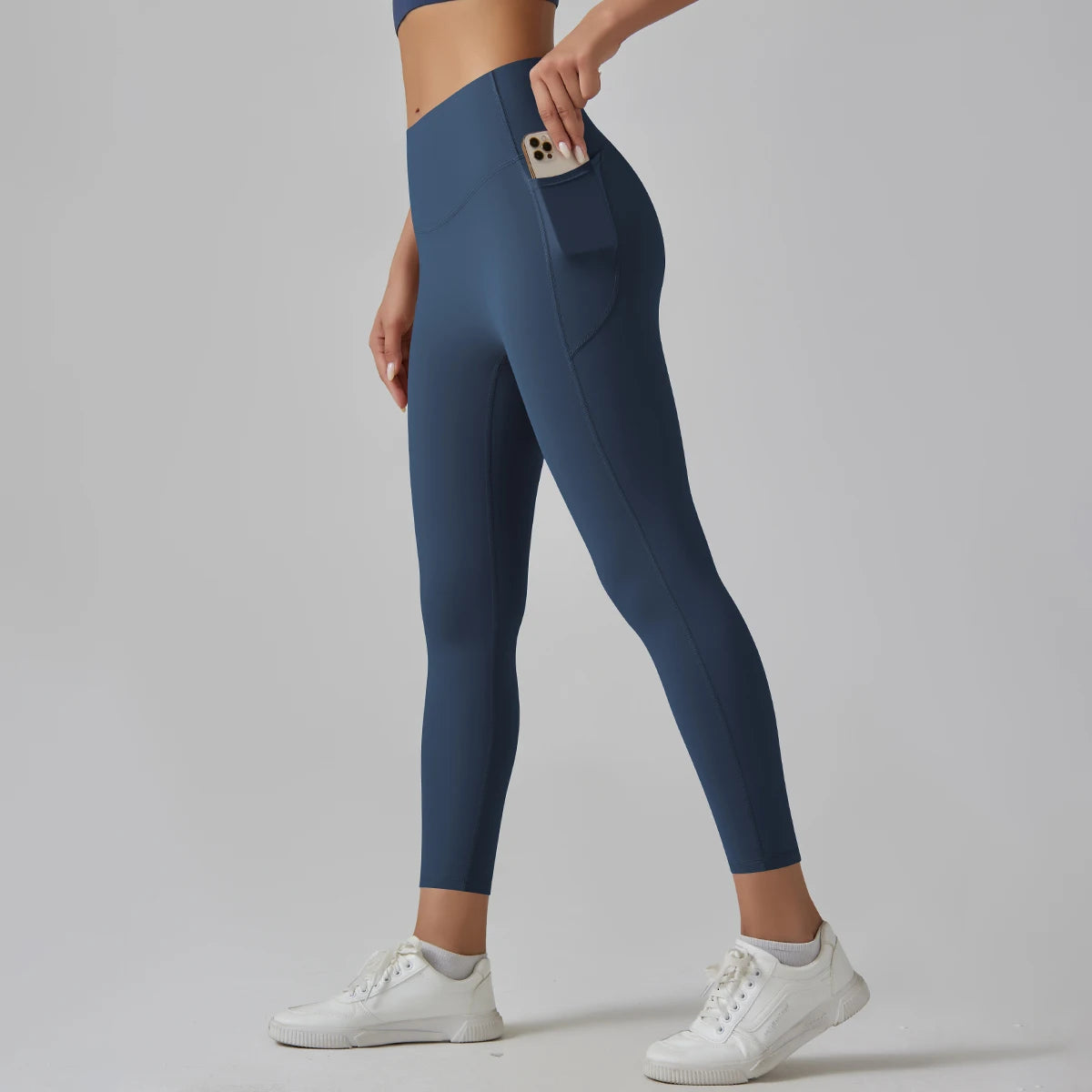 Legging de sport femme bleu marine taille haute avec coupe ajustée et maintien confortable
