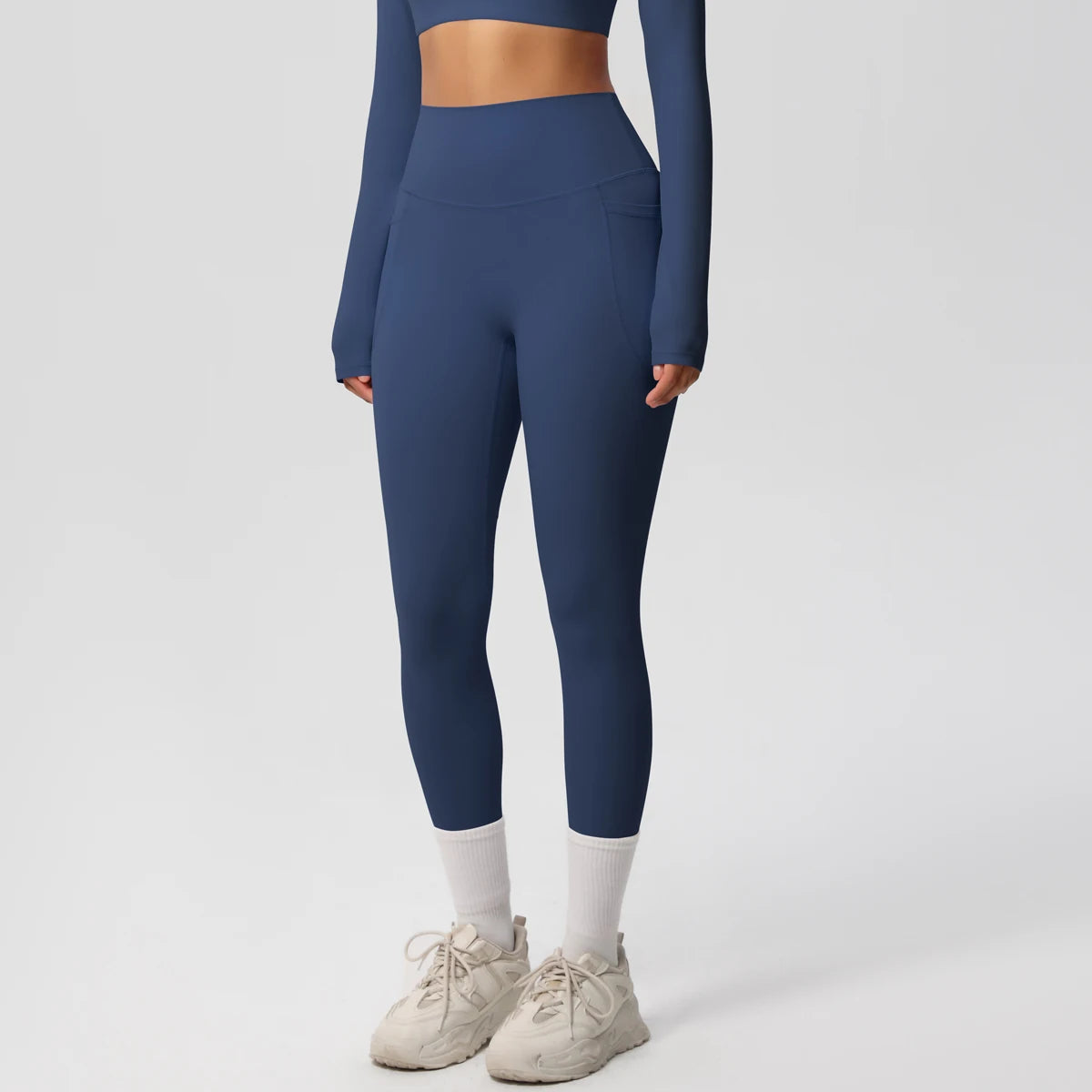 Legging de sport femme bleu marine taille haute avec coupe ajustée et maintien confortable
