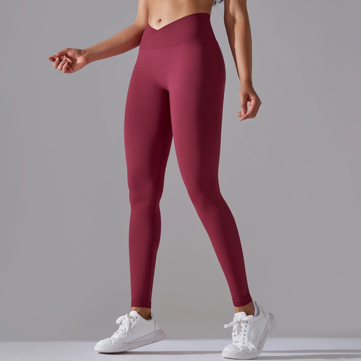Legging de sport femme bordeaux taille haute avec maintien gainant et coupe ajustée
