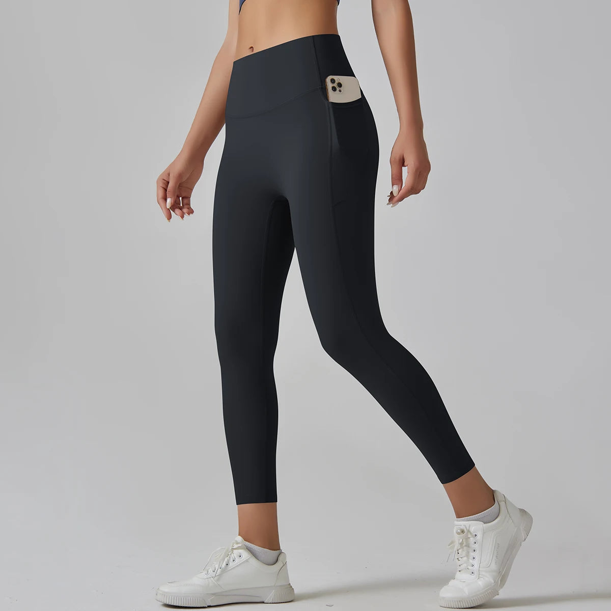 Legging de sport femme noir taille haute avec coupe ajustée et maintien confortable
