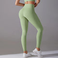 Legging de sport femme vert clair taille haute avec coupe ajustée et maintien confortable
