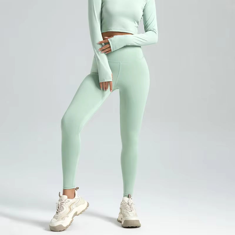 Legging de sport femme vert menthe taille haute maintien confortable silhouette affinée
