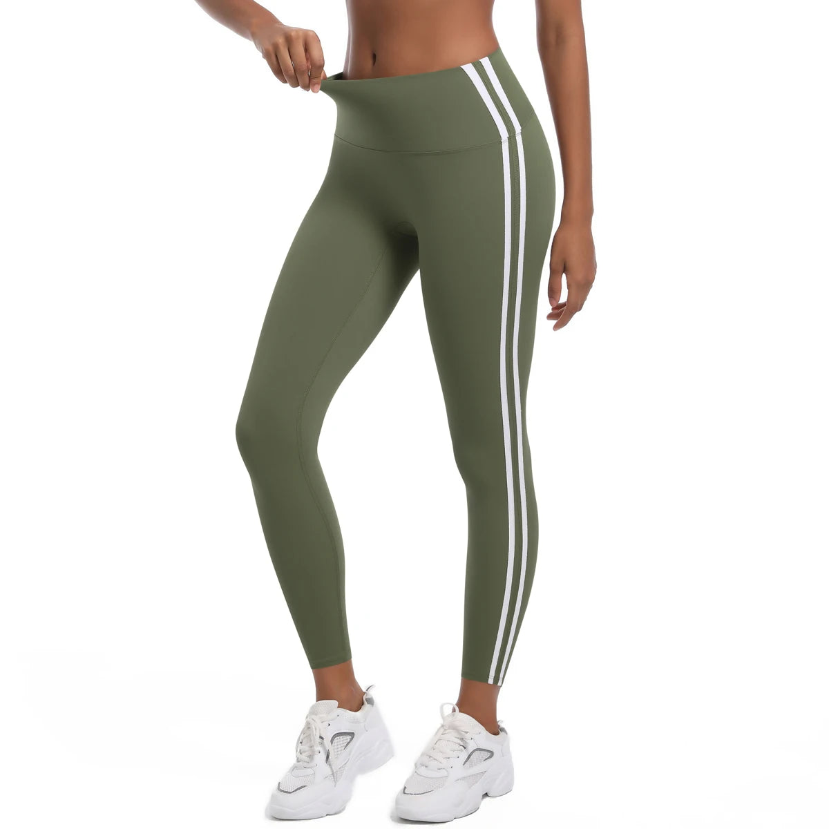 Legging de sport femme vert olive vue de profil avec bandes latérales et maintien confortable
