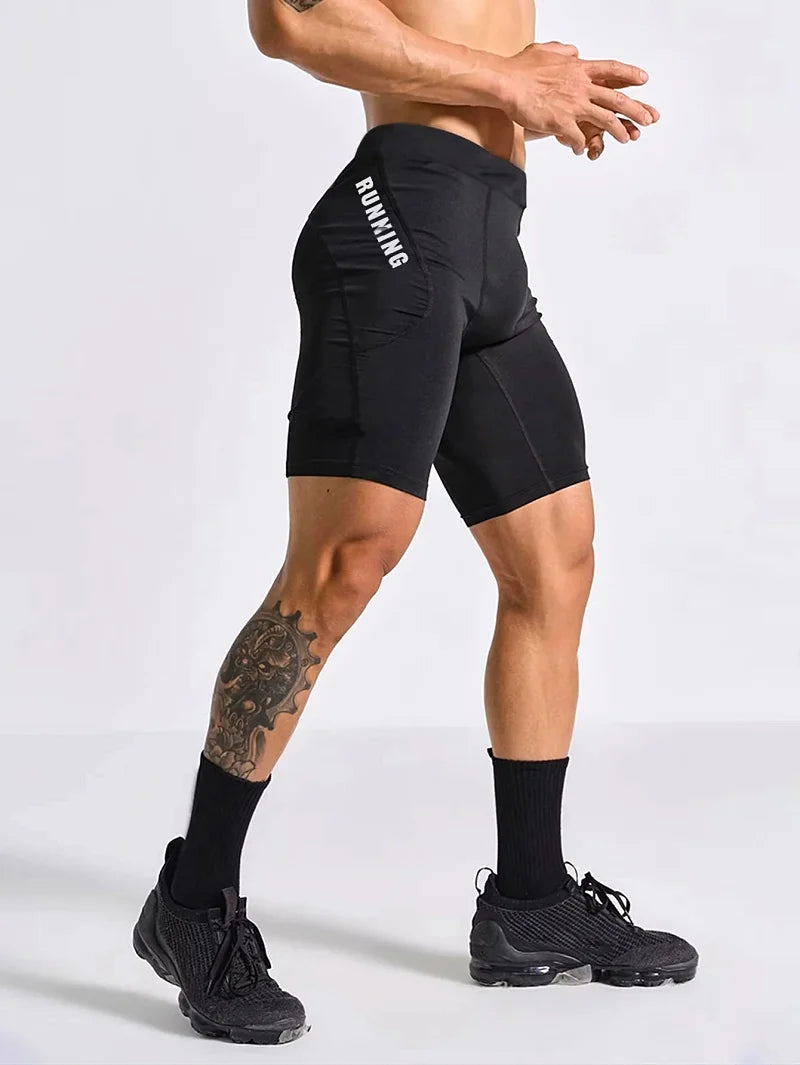 Cuissard running homme noir en polyester technique, short compression sport musculation et cardio