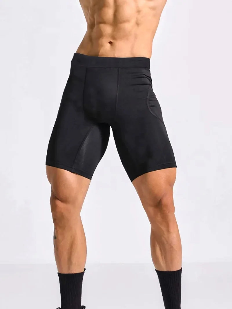 Cuissard running homme noir en polyester technique, short compression sport fitness et musculation