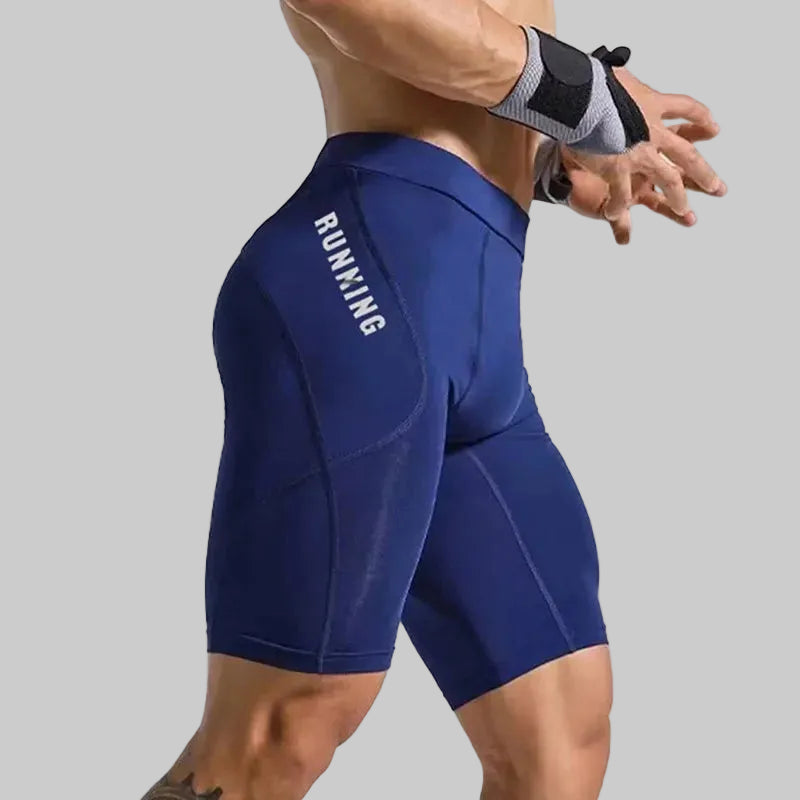 Cuissard compression homme running bleu respirant en polyester, maintien musculaire et coupe ajustée vue profil