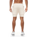 Vue arrière complète du short ECET blanc – maintien cuisse et style travaillé.