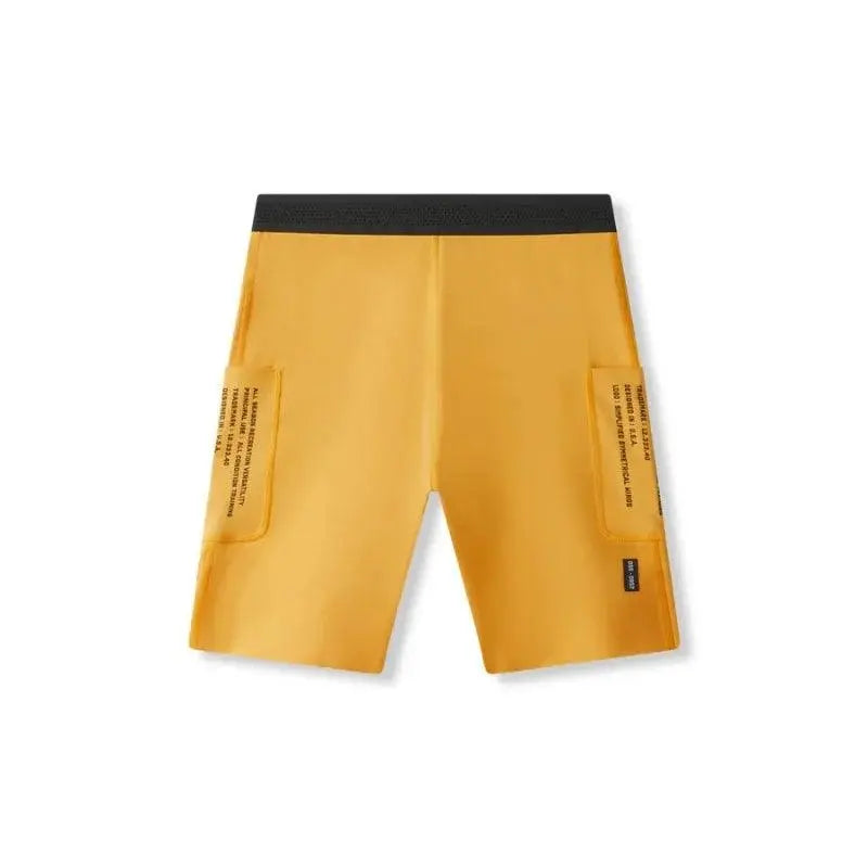 Short de running homme jaune avec poches zippées et finition de haute qualité, idéal pour la course.