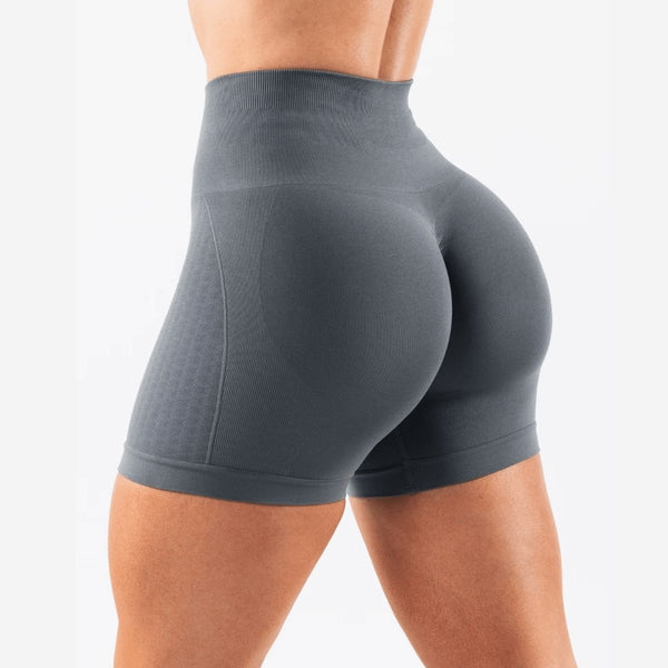 Short sport femme taille haute gris graphite, vue dos, coupe gainante et maintien confortable pour fitness et yoga.