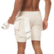 Short sport homme ECET blanc – vue arrière avec serviette glissée dans la poche, idéal pour le fitness et les entraînements intensifs.
