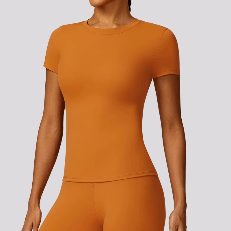 T-shirt sport femme terracotta chaud, matière extensible et respirante