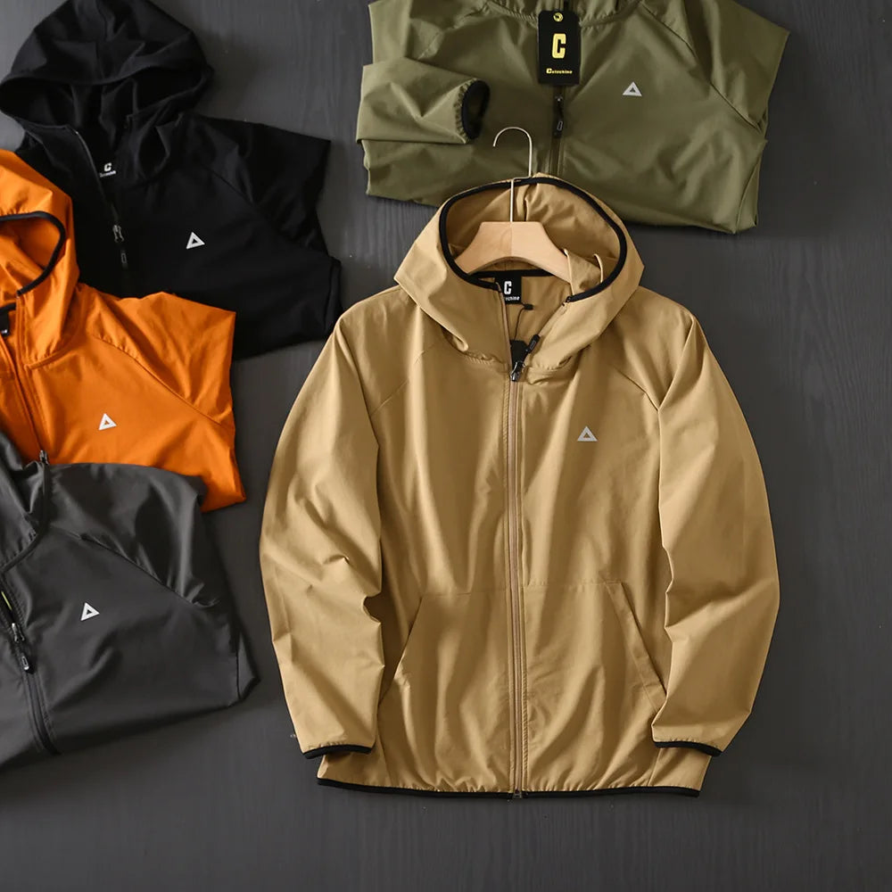 veste-sport-homme-coupe-vent-running-multicolore.webp